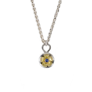 The Beacon of Hope necklace depicts a single glistening forget-me-not flower, symbolizing light, hope, and enduring love. This necklace is handcrafted using your choice of tarnish resistant sterling silver and/or solid 18K yellow gold, 18" argentium silver wheat chain & a Ceylon blue sapphire. Chloe Leigh Designs: Handcrafted Fine Jewelry
